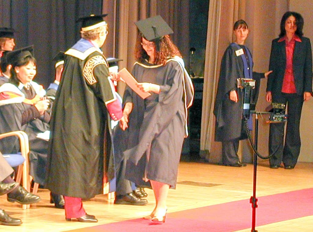 Desi~licious RD, Shahzadi Devje's graduation day picture, receiving her degree in nutrition.