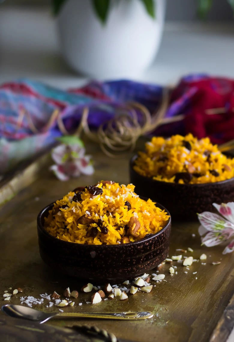 bowls of zarda (sweet rice) on a gold tray