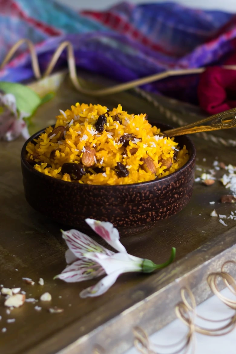 bowl of zarda (sweet rice) on a gold tray