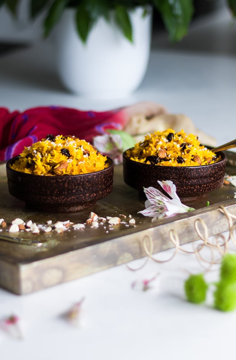 bowls of zarda (sweet rice) on a gold tray