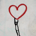 For Bell Let's Talk, an illustration of a stick person holding a red heart