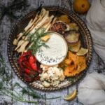bowl of desilicious chutney recipe surrounded by roasted vegetables