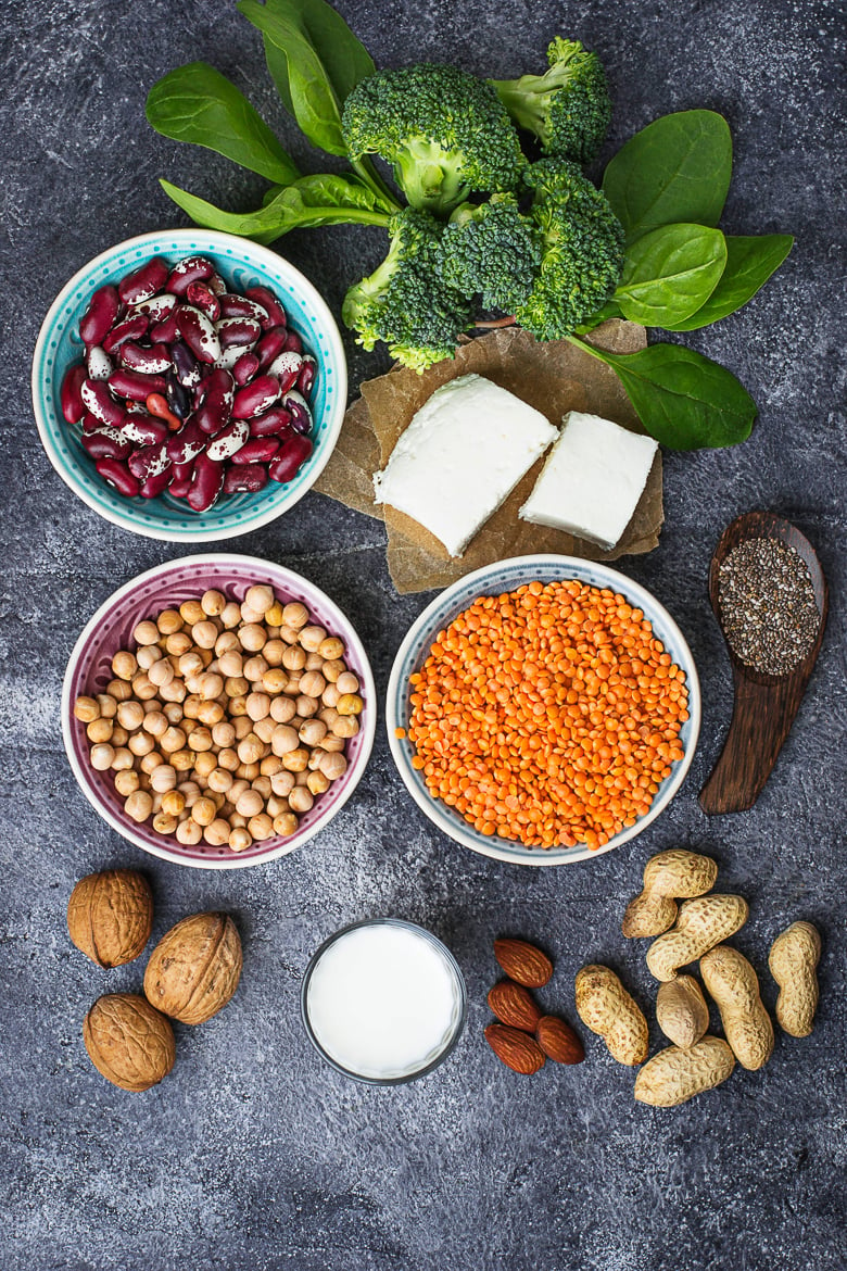 Lentils, chickpea, nuts, beans, spinach, tofu, broccoli and chia seeds. Vegan sources of protein. Selective focus