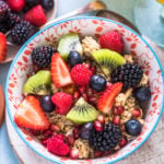 fresh fruits in breakfast bowl and honey