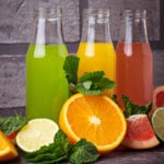 Selection of fresh citrus juices. Detox drinks. Selective focus