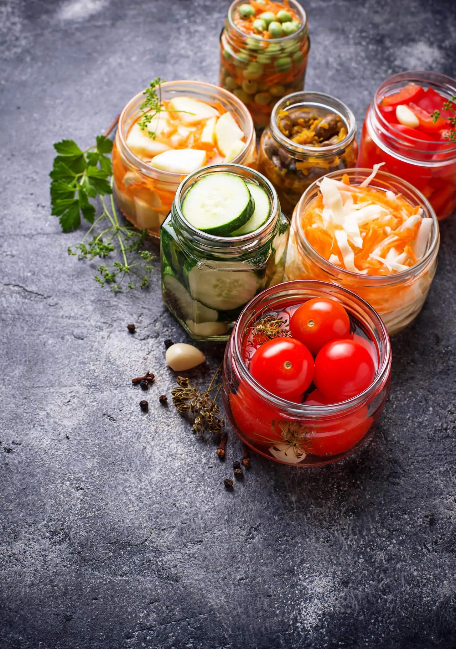 Fermented food. Preserved season vegetables in jars. Selective focus