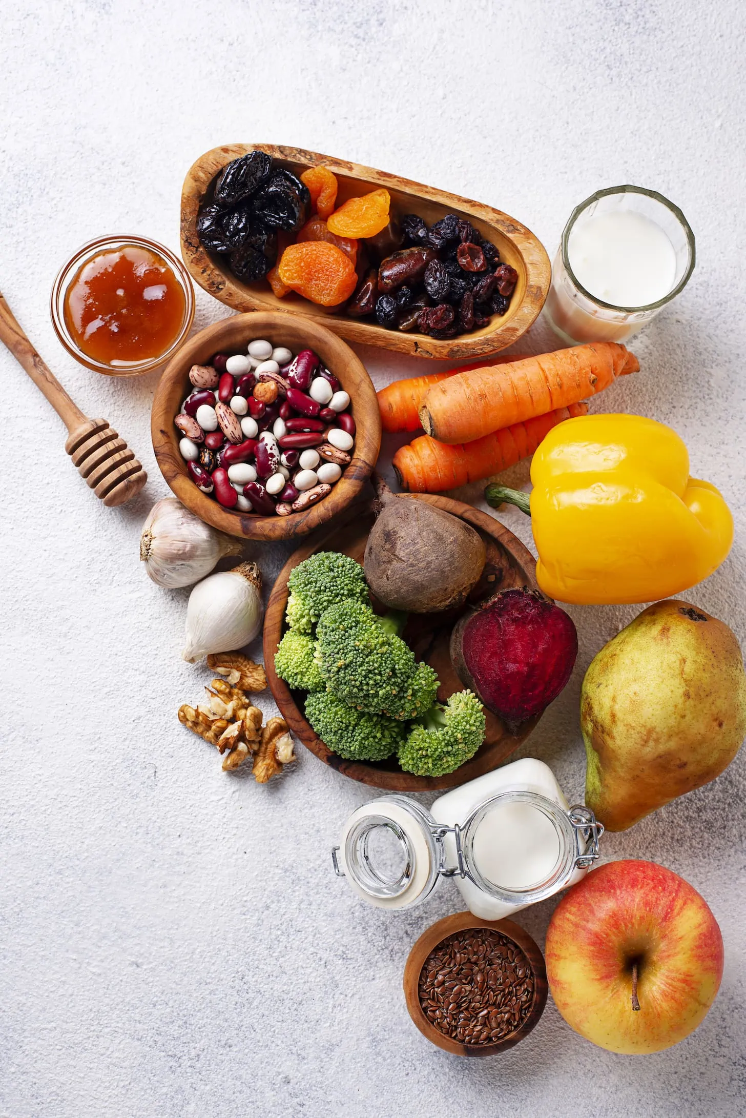 an artistic display of foods for healthy gut. Included are fruits, vegetables and legumes.