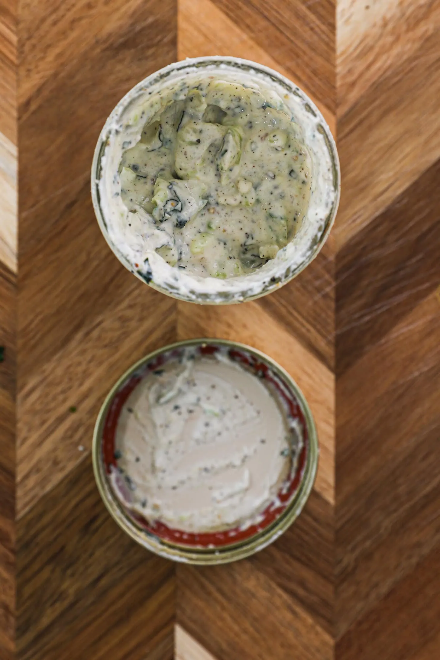 Overhead image of a mason jar of yogurt sauce or raita.