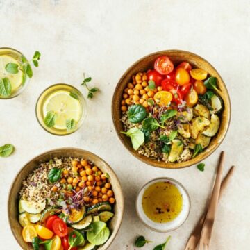 Quinoa, chickpeas and vegetables bowls. Healthy vegan lunch bowls. Food background with copy space. Top view.