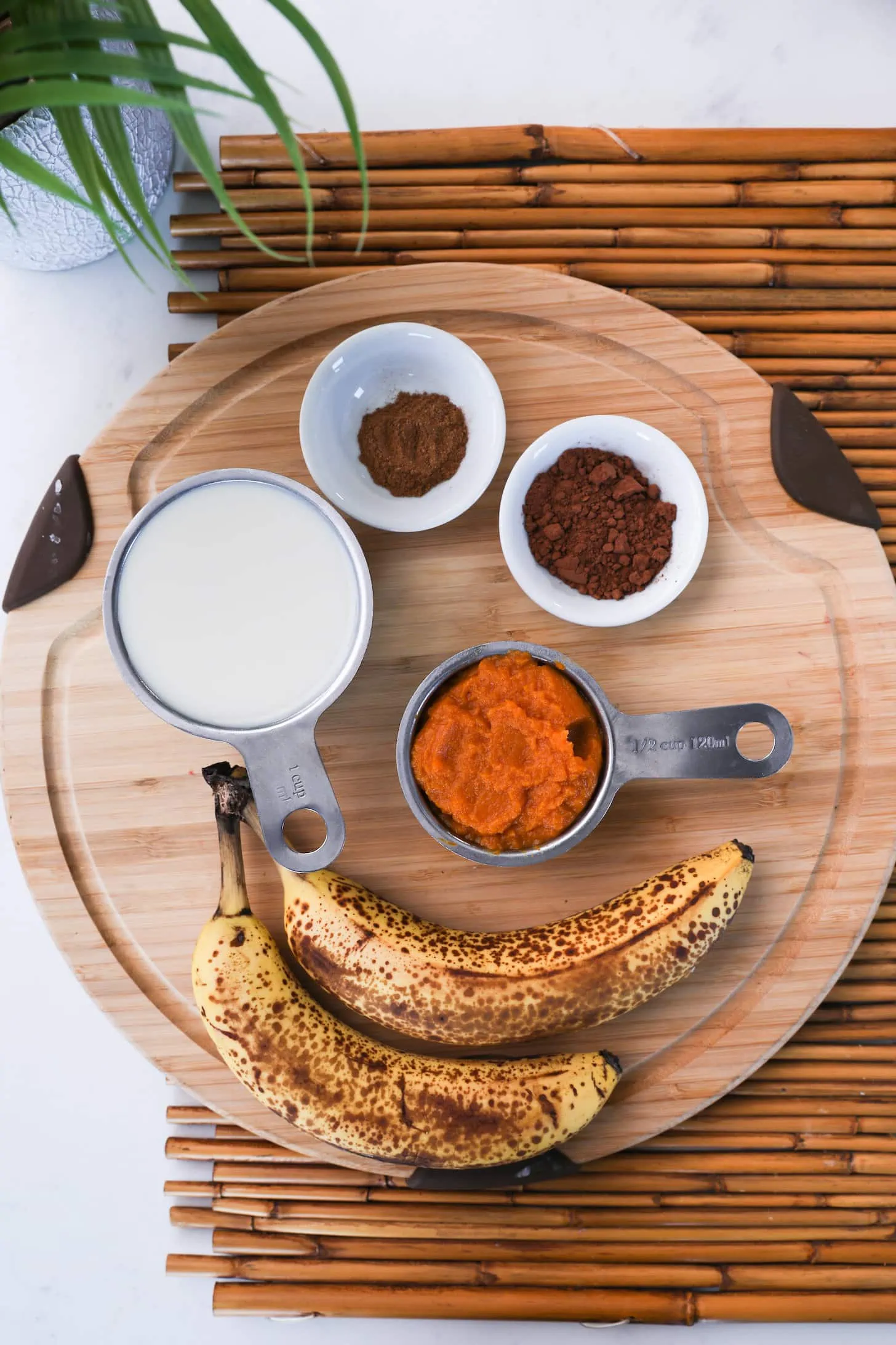 Wooden board with food ingredients laid out.