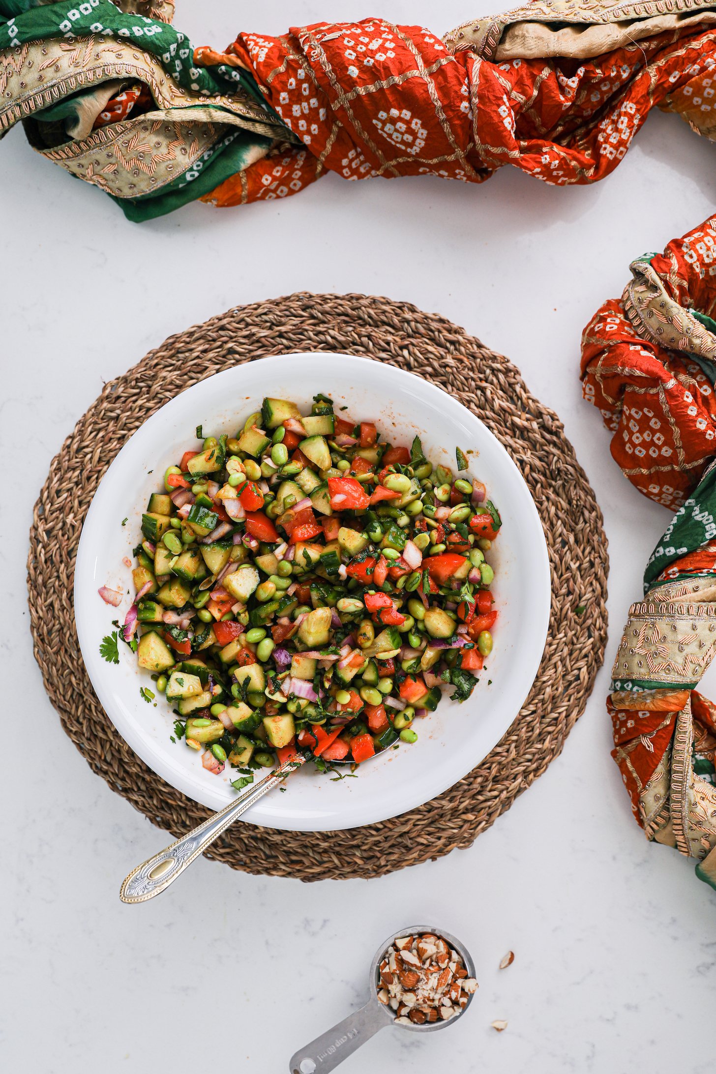 Top view of a bowl of chopped vegetables and beans.