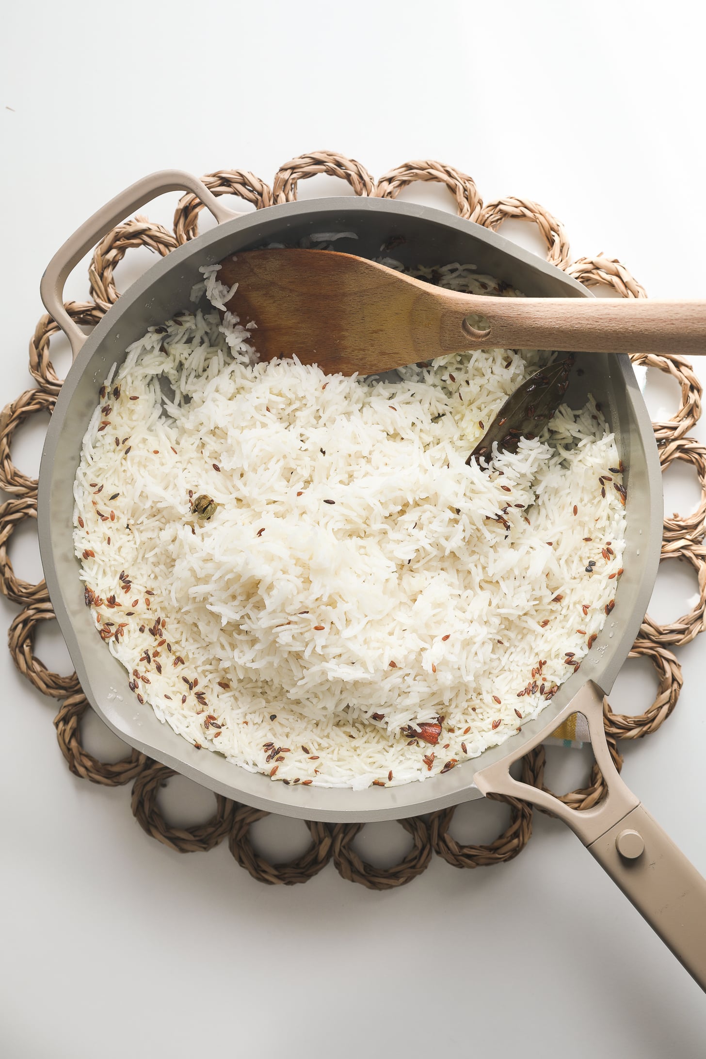 Fluffy cooked rice in a pan.